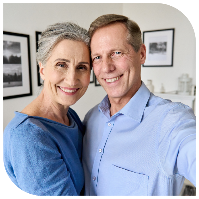happy mature couple taking a selfie