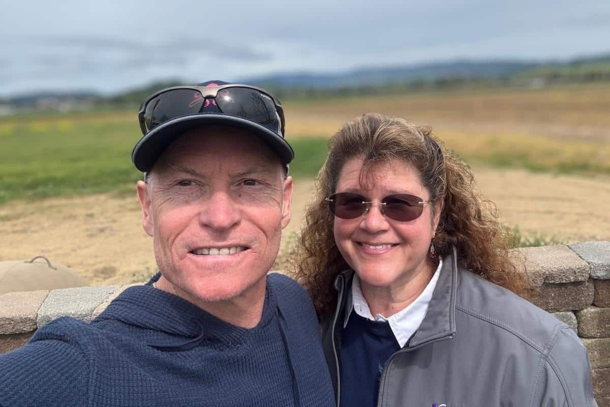 Matchmaking success couple smiling for a selfie with a natural background