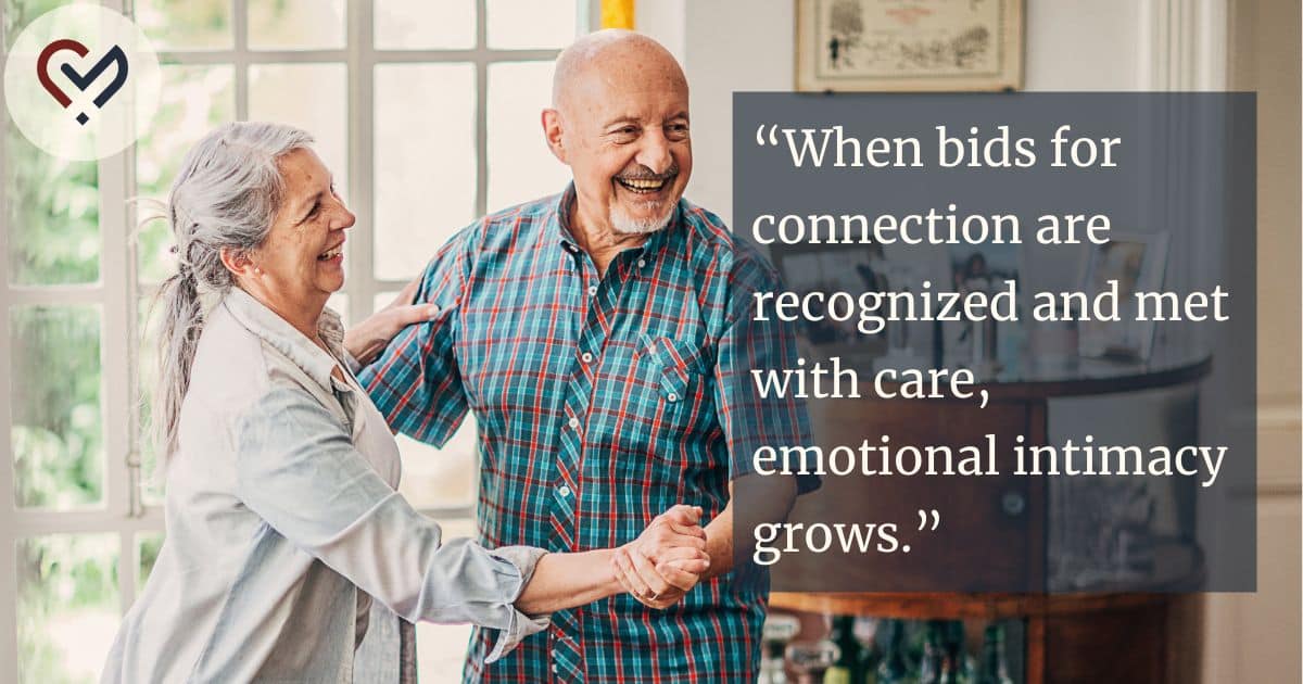 Happy couple dancing with each other, showing emotional connection and healthy relationship communication