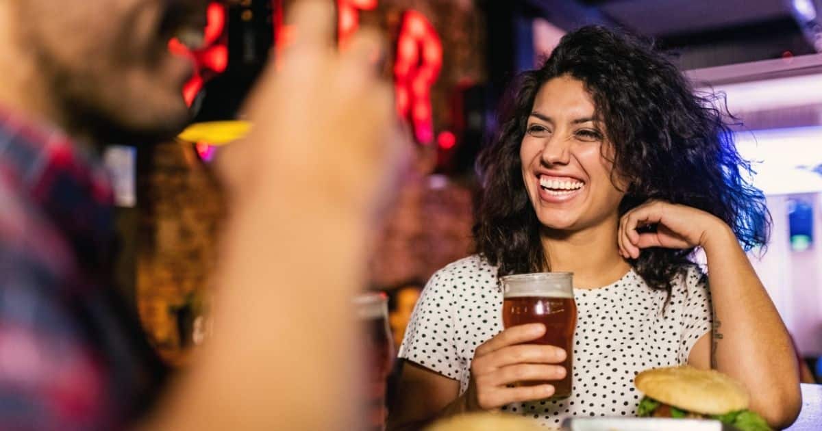A man and woman having a great conversation. Inwardly, they're each deciding whether they want to have sex on a first date, a very personal decision.