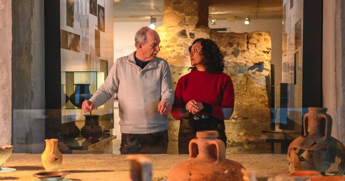 a man and woman on a date, talking about money.